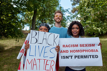 no place for hate. African American white and black BLM protestors gathered together, they want...