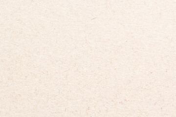 Recycled paper texture background. Blank light color cardboard, craft paper surface