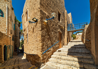 Ancient stone houses and narrow street in old Jaffa, Israel.