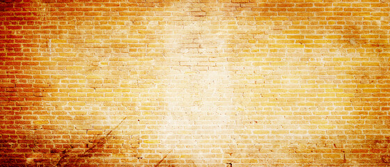 old brown parchment paper background with yellowed vintage grunge texture borders and off white light center with distressed faded antique colors