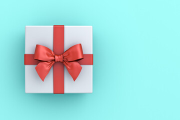 Gift box or present box with red ribbon and bow isolated on green blue pastel color background with blank space 3D rendering