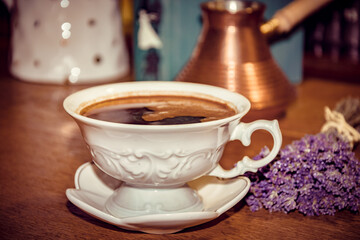 a cup of coffee with lavender