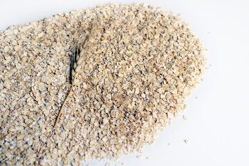 Porridge oat flakes on white background. whole oats isolated on a white background. Healthy Eating concept-Oat Flakes.