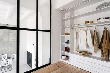 White and large wardrobe closet in dressing room
