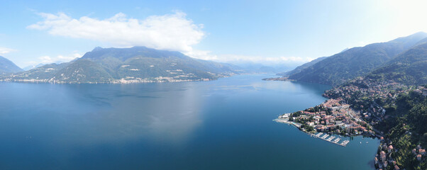 aerial panorama of  varenna village at lake como during summer in sunset  