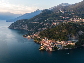Fototapeta premium aerial panorama of varenna village at lake como during summer in sunset 