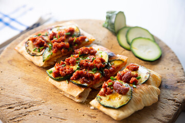 Coca from mallorca with sobrassada and zucchini