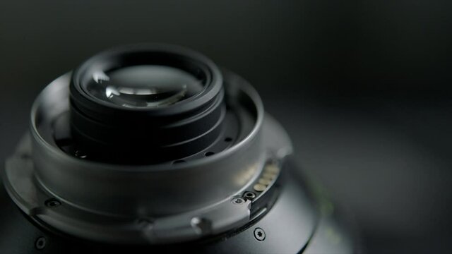 Close up camera lens and unscrewing the bolt of filter on it in rental house