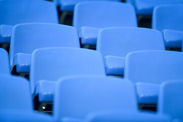 Empty soccer stadium tribune. As a safety measure during corona virus pandemic, soccer matches are taking place without public