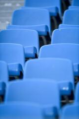 Fototapeta premium Empty soccer stadium tribune. As a safety measure during corona virus pandemic, soccer matches are taking place without public