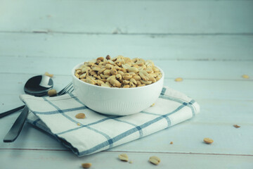 Bowl of roasted peanuts for Thai food ingredient