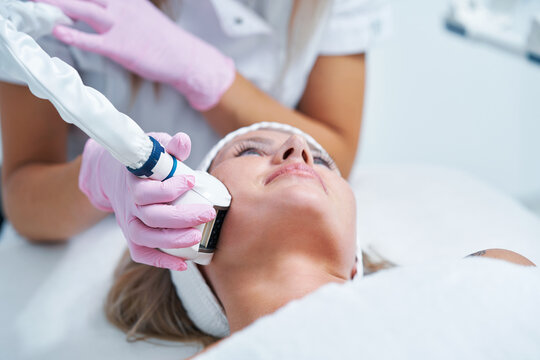 Adult Woman In Beauty Salon Undergoing Face Hydrogen Purification