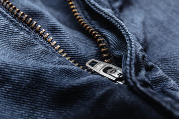 Close up of blue jeans zipper