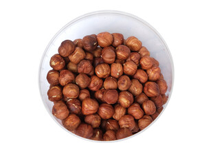fried hazelnuts in a bucket on a white background