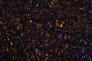structure of crushed metal sheet of purple-orange color