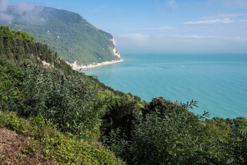 Clear blue sea and coastline seen from Mount Conero near Sirolo in Ancona, Marche, Italy