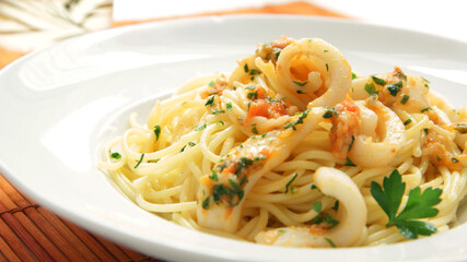 Spaghetti with calamari and vegetables