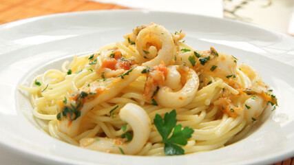 Spaghetti with calamari and vegetables