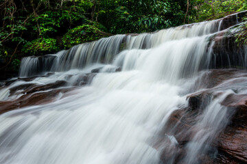 Obraz premium Beautiful waterfalls in the green forest in the forest area of ​​Phu Lanka National Park, Bueng Kan Province, Thailand
