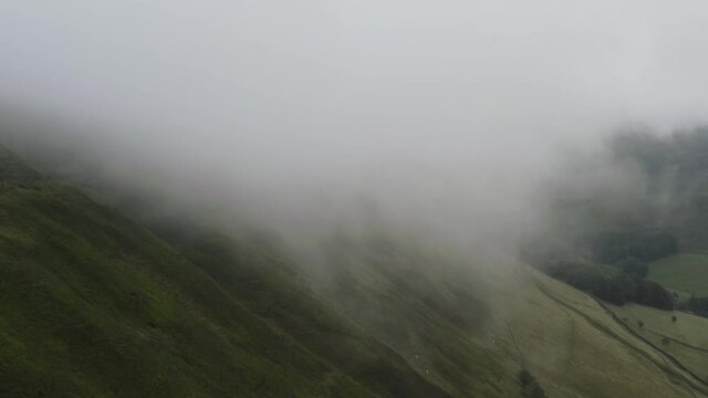 Peak District low cloud aerial shot with fog and clag