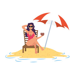 young woman relaxing on the beach seated in chair and umbrella