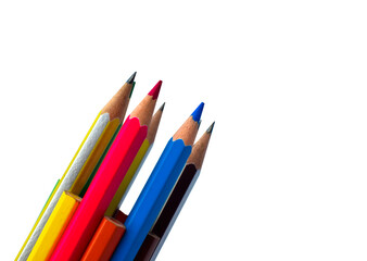 Fototapeta premium Pile of different colored wood pencil crayon placed on a white background