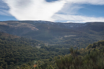 Obraz premium Views from afar of the Sierra de Bejar with snow in Salamanca, Castilla Leon, Spain, Europe. Trees and vegetation.