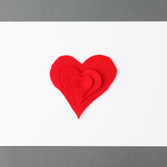 Album sheet of paper with red hearts.