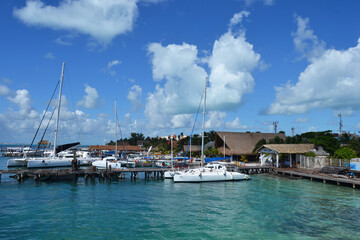 Fototapeta na wymiar overview of harbour at isla mujeres mexico with nice clowds and sunny sky