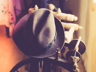 Vintage hat of wool in an authentic antique historical environment