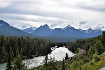 Railway track by the river in the mountain