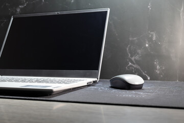 Notebook computer Placed on the desk in the home, business, and management (home work concept)