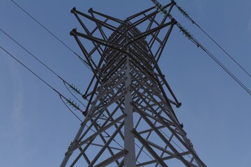 Low angle shot of power transmission tower