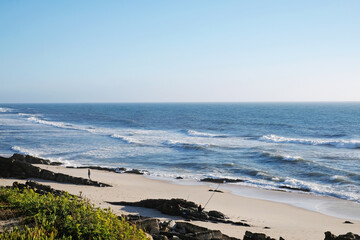 Fototapeta na wymiar The Atlantic Ocean at Pedrógão Beach in Portugal