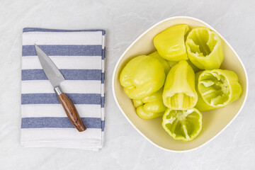 Yellow paprika in the bowl on the table