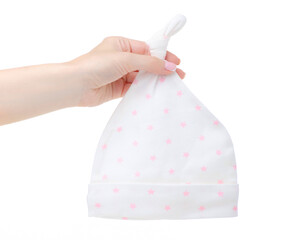 Hand holding baby hat on white background isolation