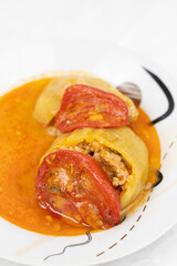 Stuffed paprika with minced meat and served on the plate