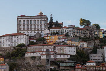 Fototapeta na wymiar Porto or Oporto  is the second-largest city in Portugal and one of the Iberian Peninsula's major urban areas. Porto is famous for  Houses of Ribeira Square located in the historical center of Porto, P