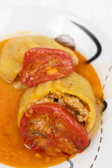 Stuffed paprika with minced meat and served on the plate