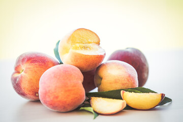 Organic cultured ripe peach fruits