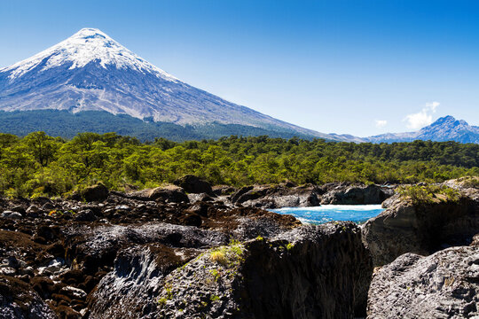 Saltos del Petrohue waterfalls and volcano Osorno in National Park Vicente Perez Rosales, Chile
