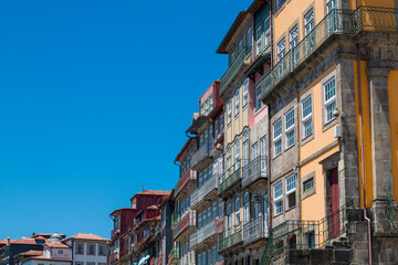 Fototapeta na wymiar Porto or Oporto  is the second-largest city in Portugal and one of the Iberian Peninsula's major urban areas. Porto is famous for  Houses of Ribeira Square located in the historical center of Porto