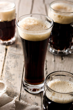 Traditional kvass beer mug on wooden table
