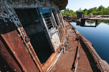 Abandoned sunken Barges Boats On River Pripyat in Chernobyl exclusion Zone. Chernobyl Nuclear Power...