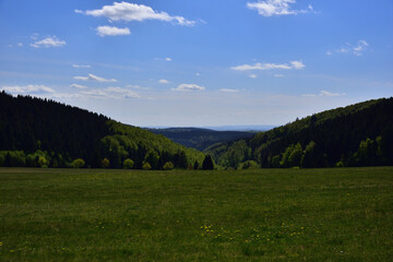 Fototapeta na wymiar mountain landscape with blue sky and clouds