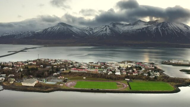 Aerial drone flight over football fields at Reykjavik, Iceland 4k