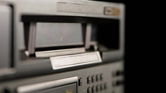 Inserting and Ejecting a Videocassette from a Broadcast Video Recorder