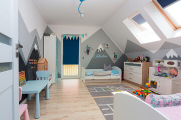 Children bedroom for a boy and a girl with painted mountains on the walls - Powered by Adobe
