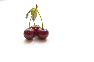 photo of cherries on a white background
