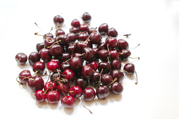 photo of cherries on a white background